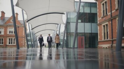 Covered Walkway Solutions UK: Architectural Fabric Shading for Schools & Businesses
